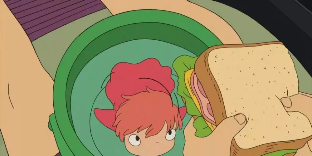 Studio Ghibli's Ponyo when she is a goldfish about to eat the ham from Sosuke's sandwich