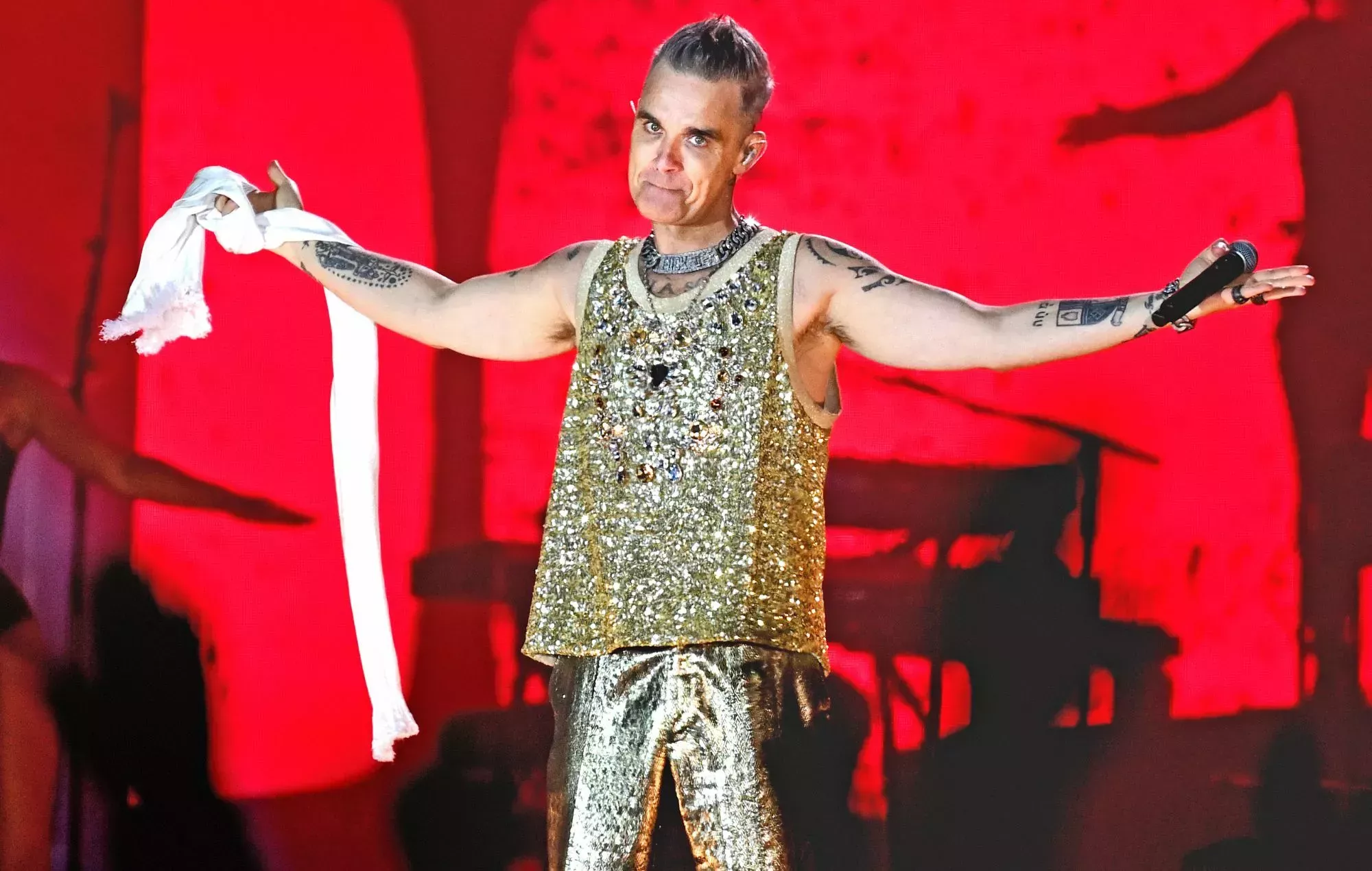 Robbie Williams recuerda cómo se ensució en el escenario con Take That
