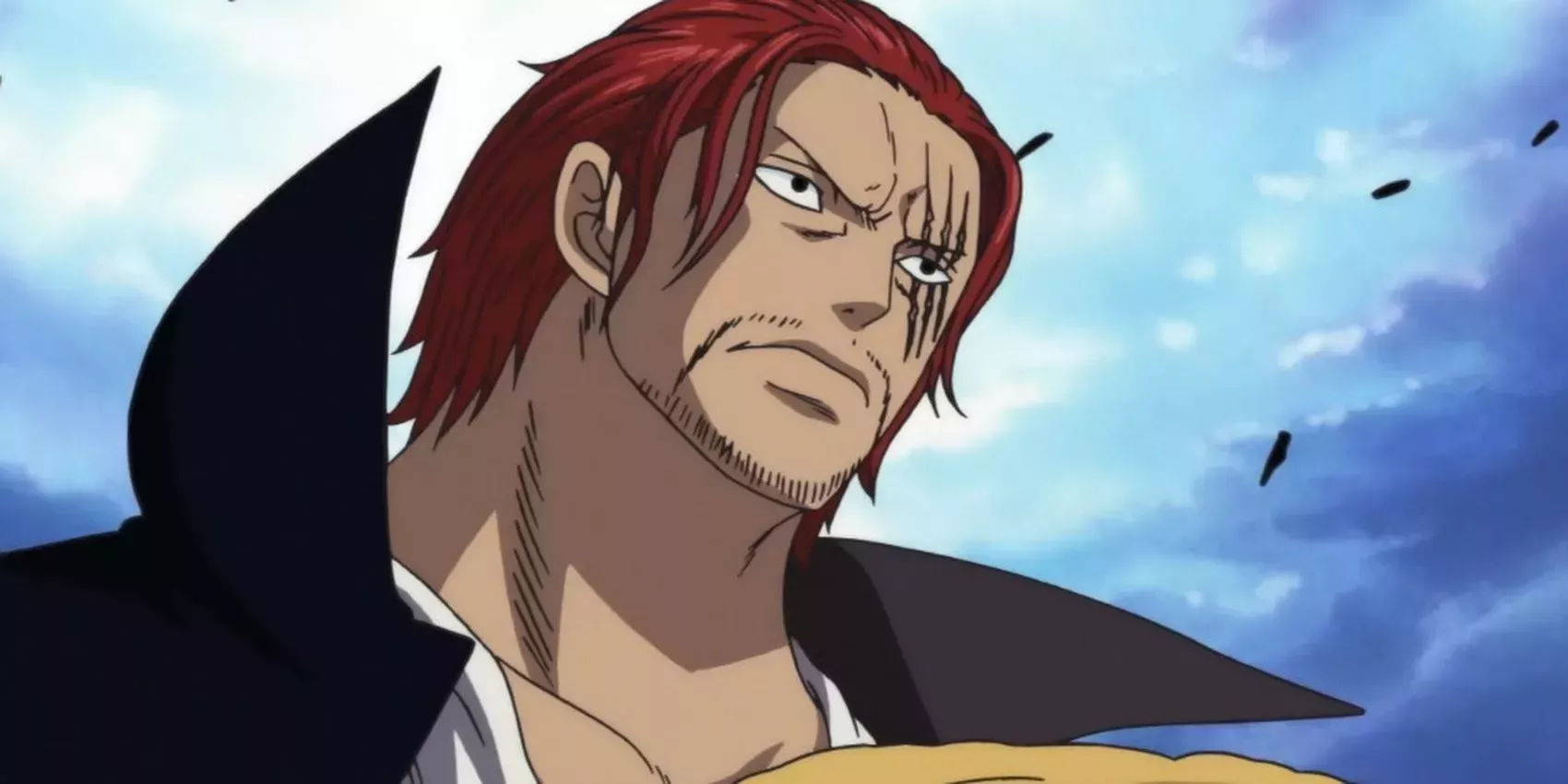 shanks in one piece looks serious with a high collared cloak.