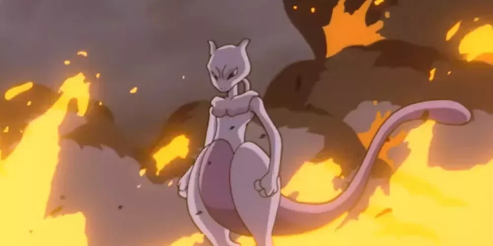 Mewtwo stands among flames in Pokemon: The First Movie - Mewtwo Strikes Back