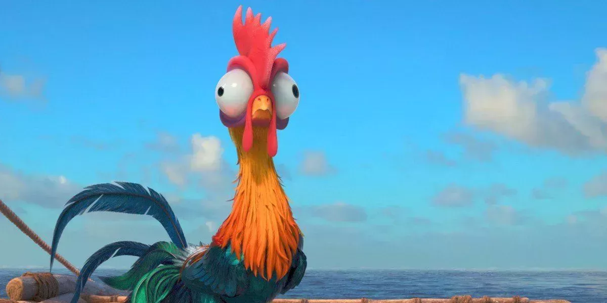 Hei Hei stands on Moana's raft with a bright blue sky behind him in Moana