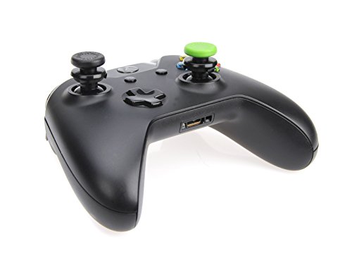Amazon Basics - Tapones para mando de Xbox One, 4 unidades, Negro y verde