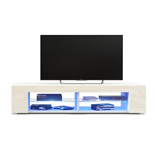 Vladon Mueble TV Movie, Cómoda TV con 4 Compartimentos Abiertos y Franjas Decorativas, Blanco Mate/Crema de Alto Brillo, incluida la iluminación LED Azul (134 x 29 x 39 cm)