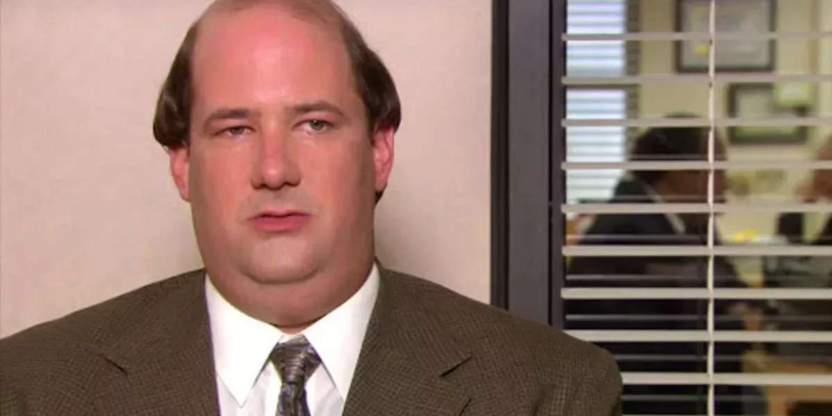 Kevin from the Office looking at the camera with a serious expression