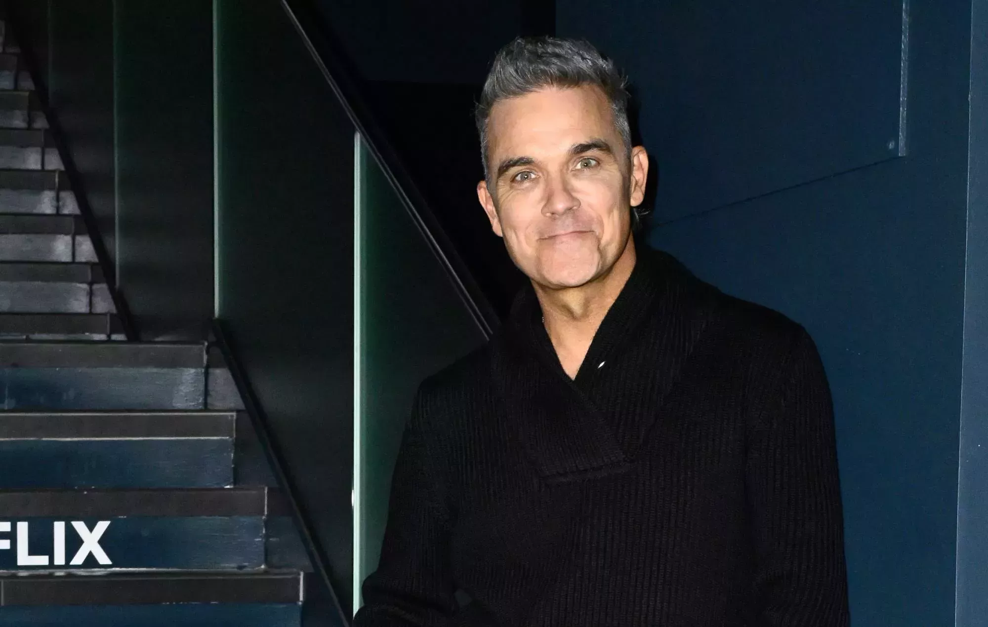 Un fan de Robbie Williams en estado grave tras caerse durante un concierto