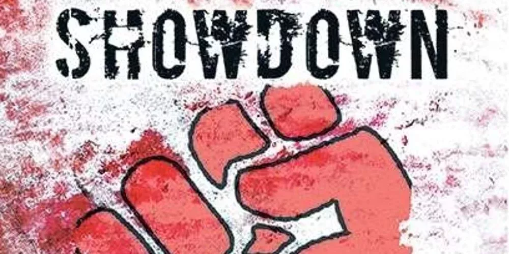 Cropped cover art from Showdown RPG, depicting a red stylized fist