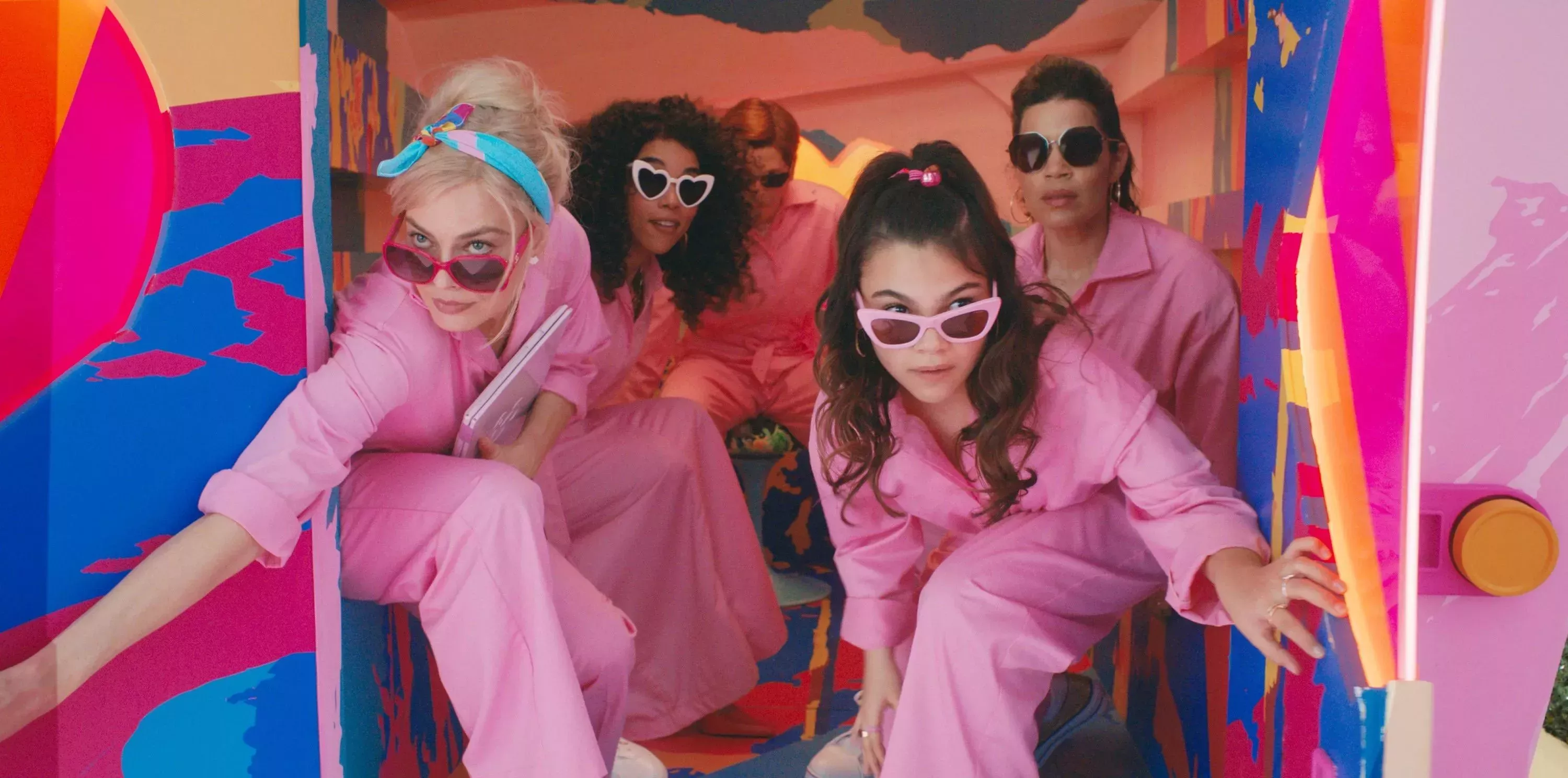 Wearing pink disguises, Barbie, Sasha, Gloria, and the other dolls take back Barbieland