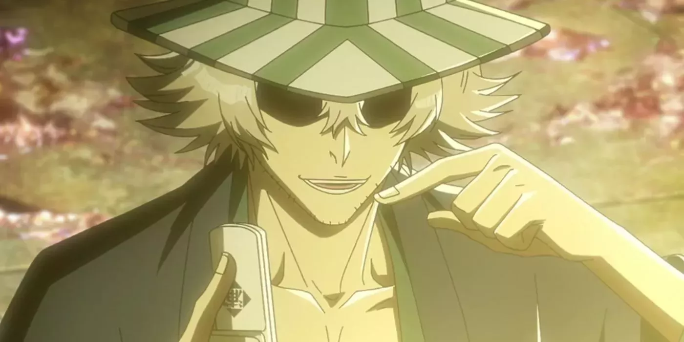Kisuke Urahara points at his soul pager in Bleach: Thousand-Year Blood War