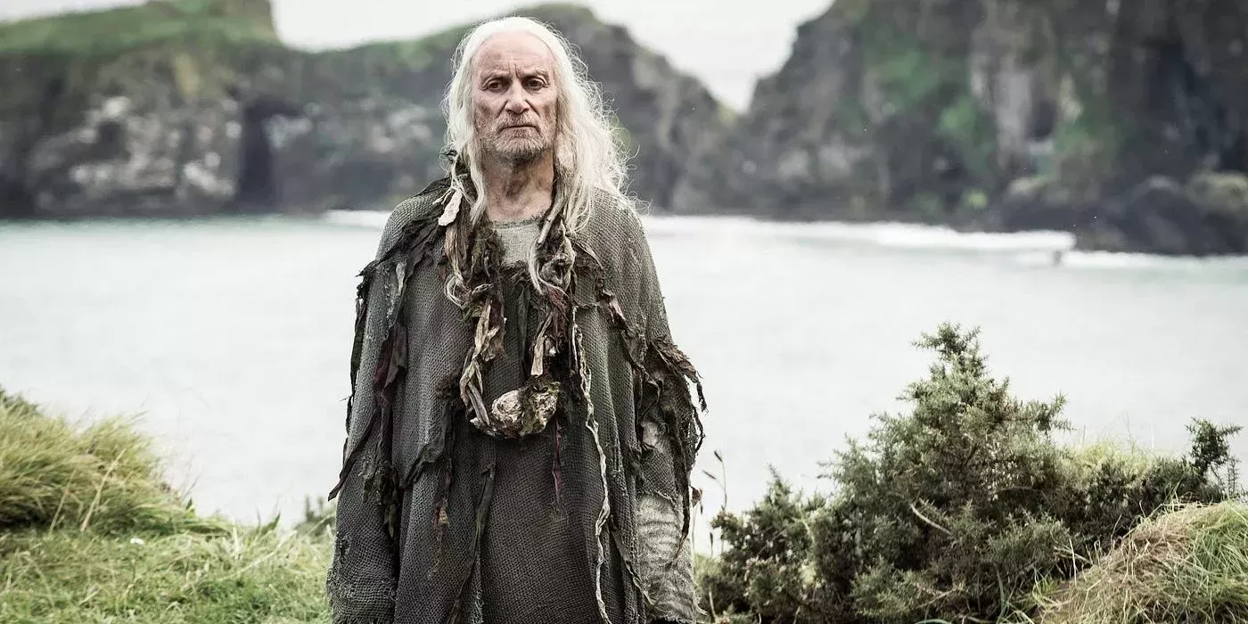 Aeron Greyjoy standing in front of the waters of the Iron Islands