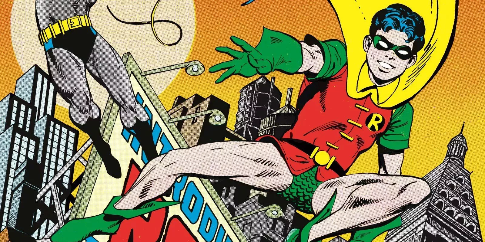 A remastered Ed Hannigan cover has Batman and Robin move through the streets of Gotham