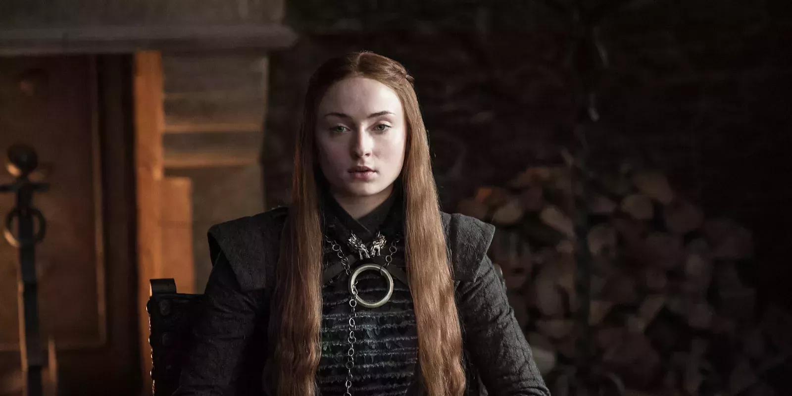 Sansa Stark in her black dress at Winterfell in Game of Thrones.