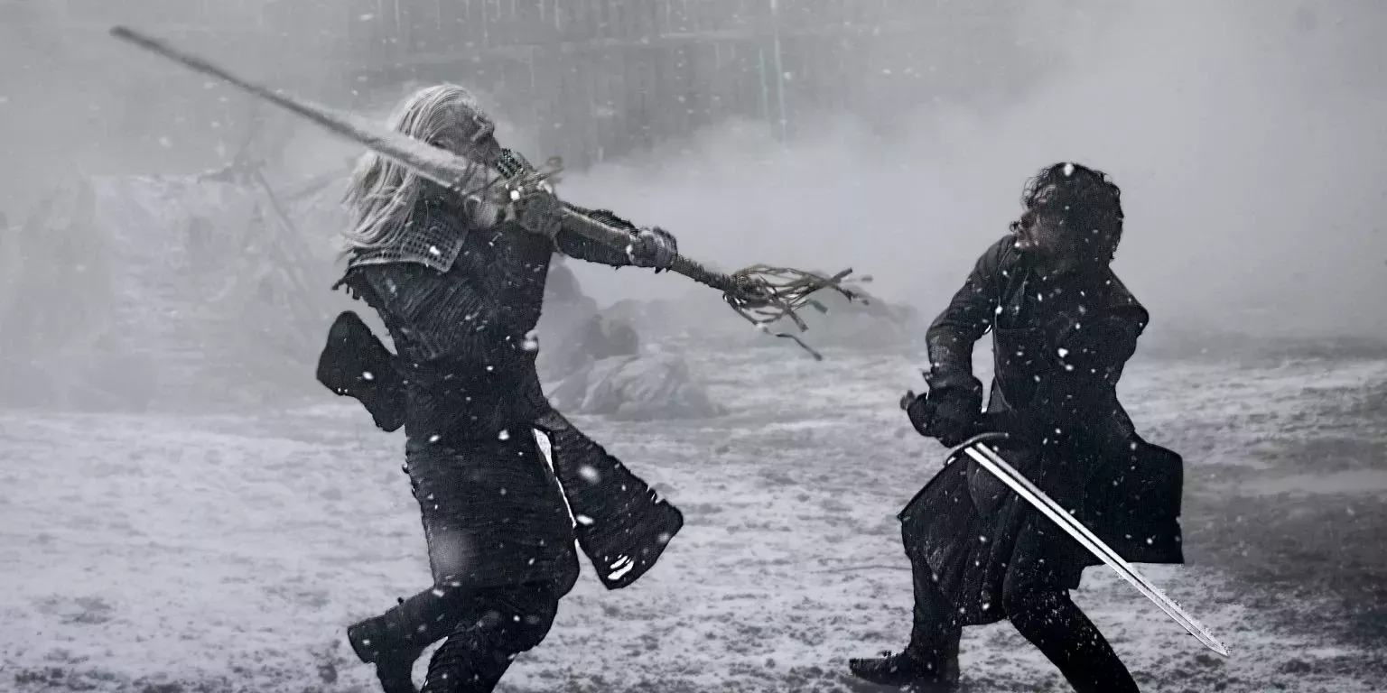Jon Snow with sword in hand facing off against a White Walker at Hardhome 