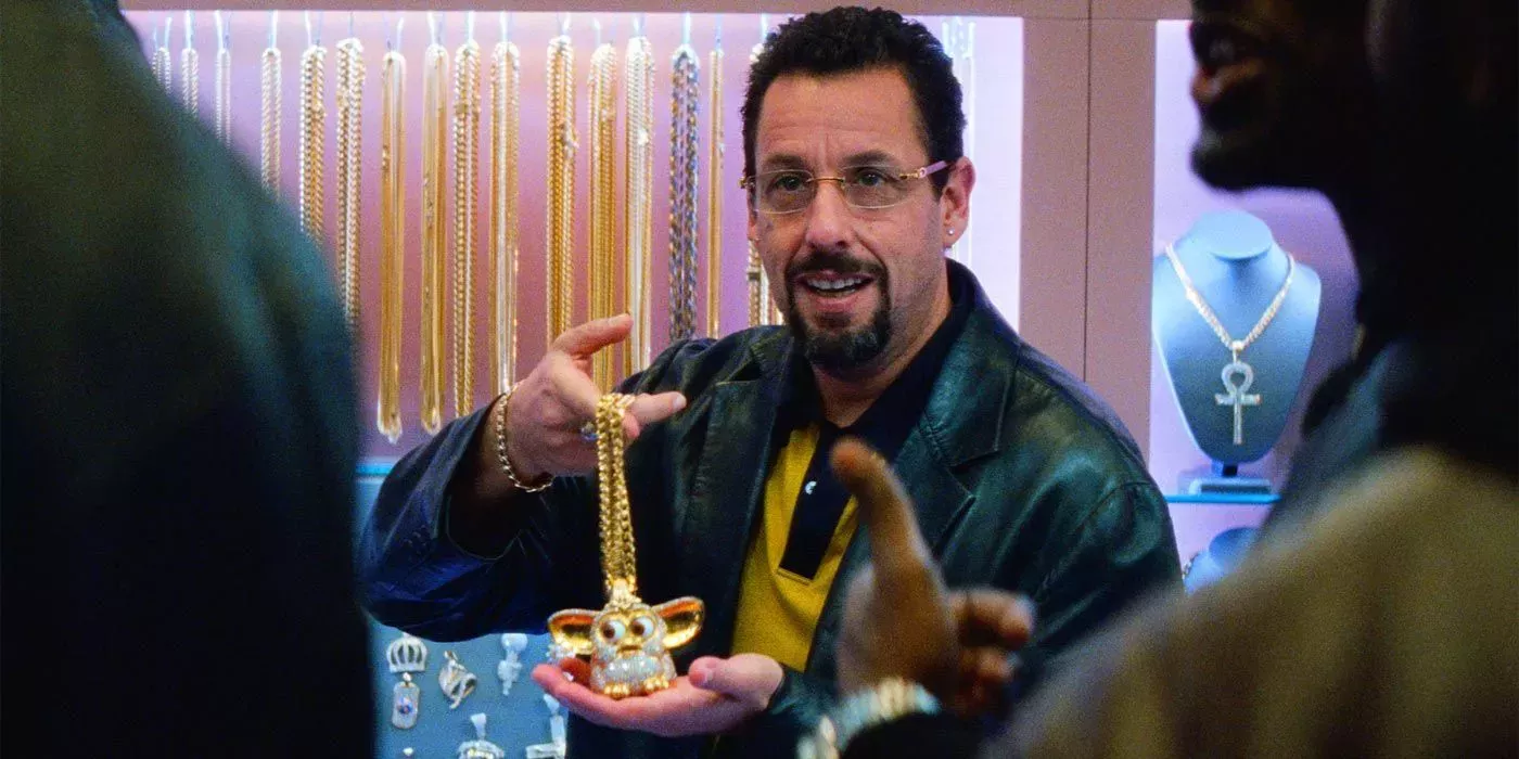Adam Sandler showing off a Furby chain in Unct Gems