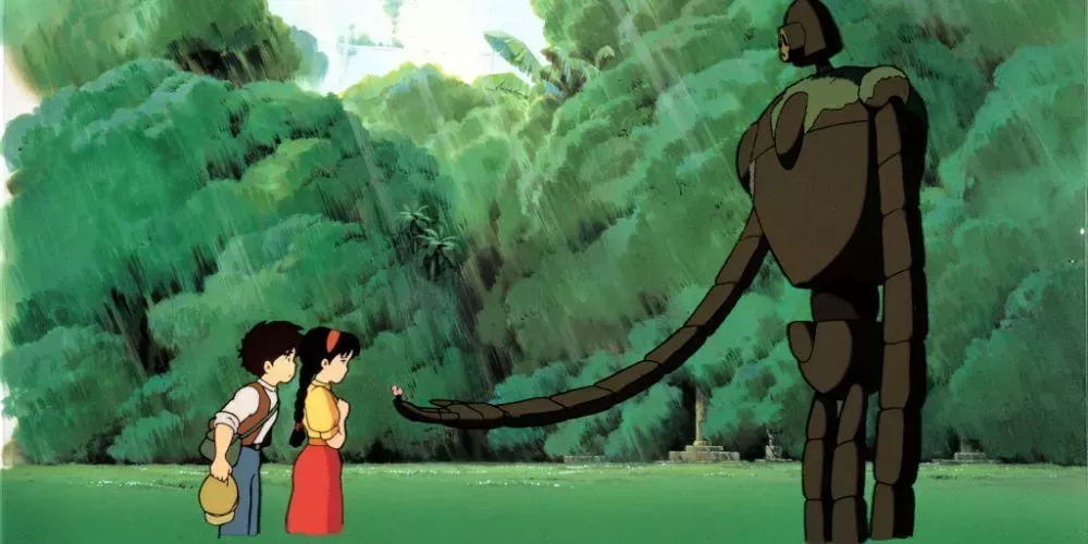 The Robot Soldier in Castle in the Sky offers a flower to Sheeta and Pazu