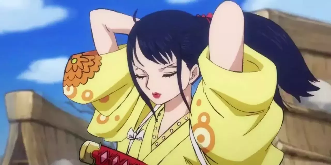 Kikunojo holds up her hair in one piece