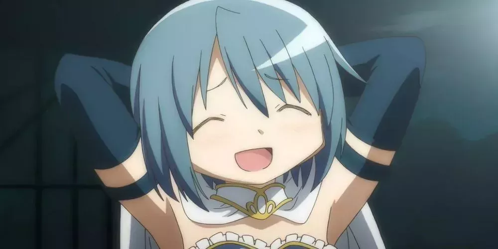 Sayaka transformed and smiling with her hands behind her back in Puella Magi Madoka Magica.