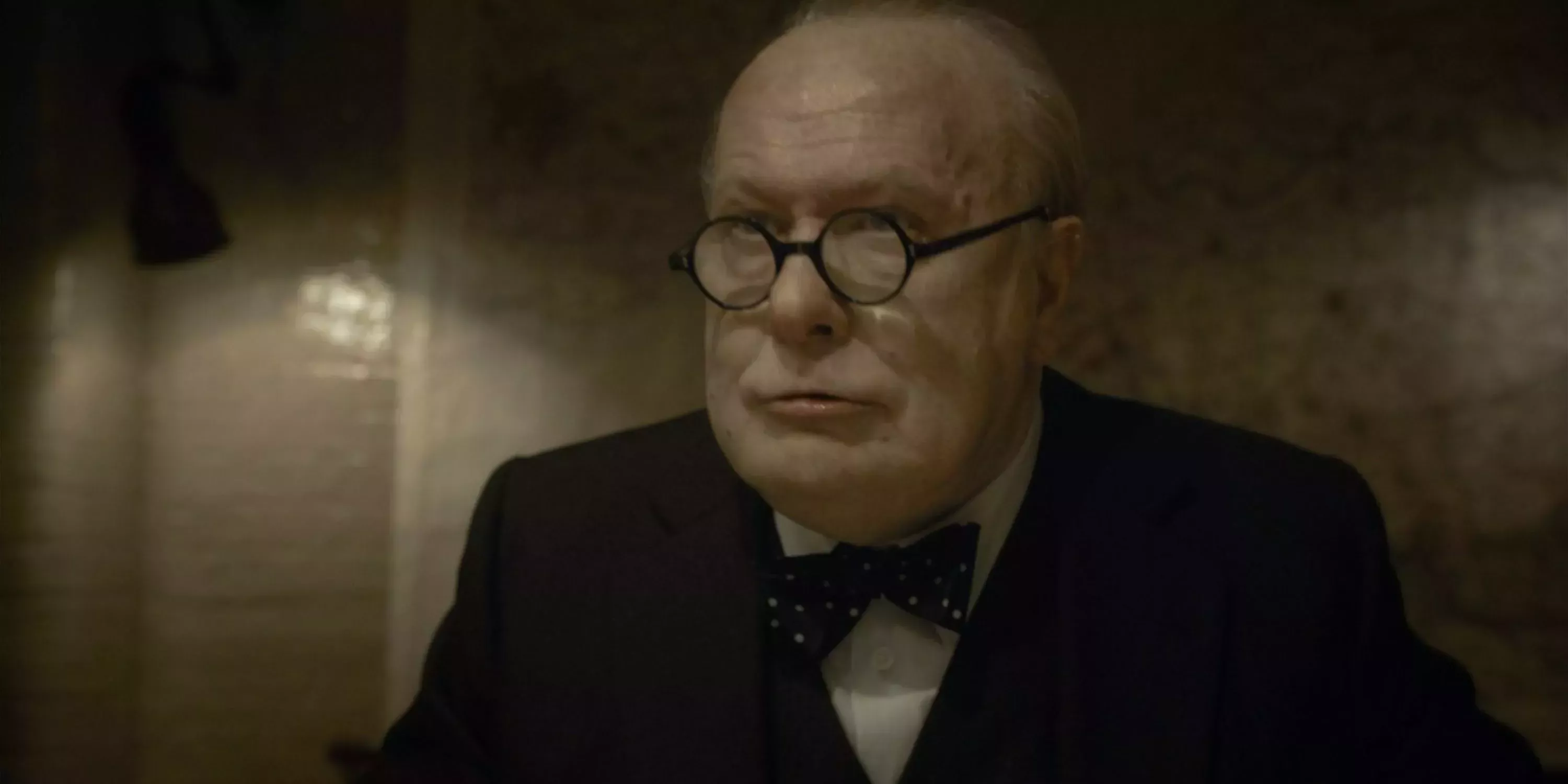 Gary Oldman as Winston Churchill looks over in Darkest Hour