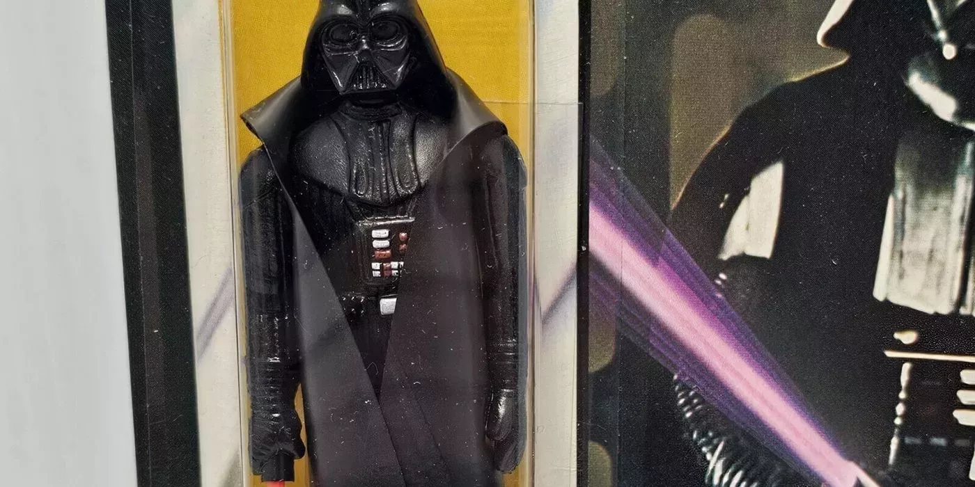 Darth Vader Kenner action figure with purple lightsaber packaging