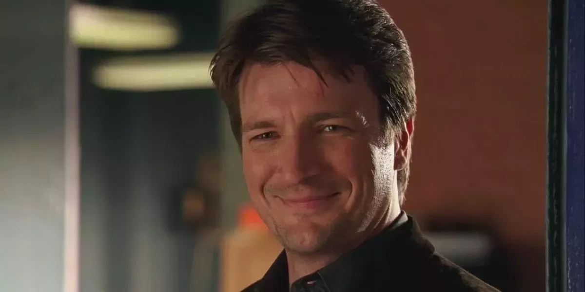 Nathan Fillion as Richard Castle in Castle, smiling.