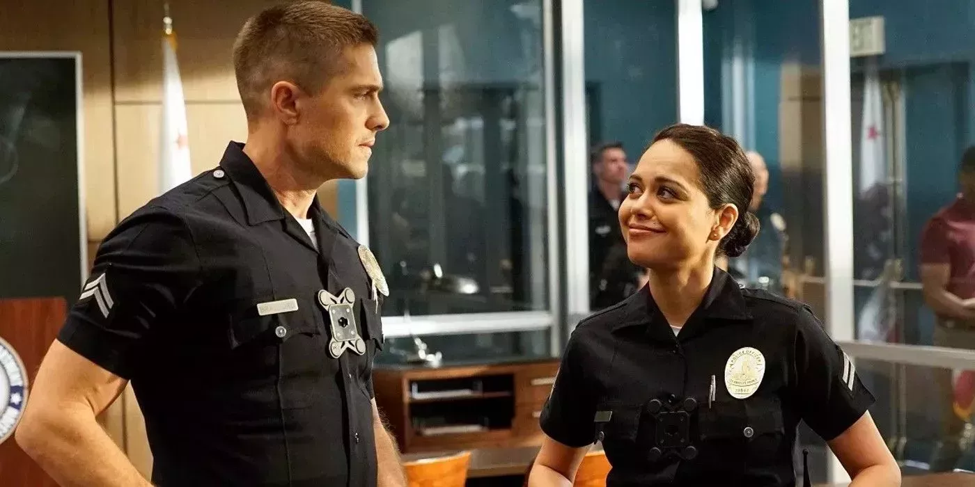 Tim Bradford and Angela Lopez in uniform together in The Rookie Season 2