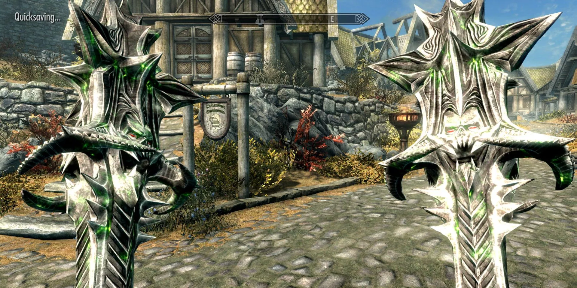 The player dual wielding the Mace of Malog Bal in Skyrim