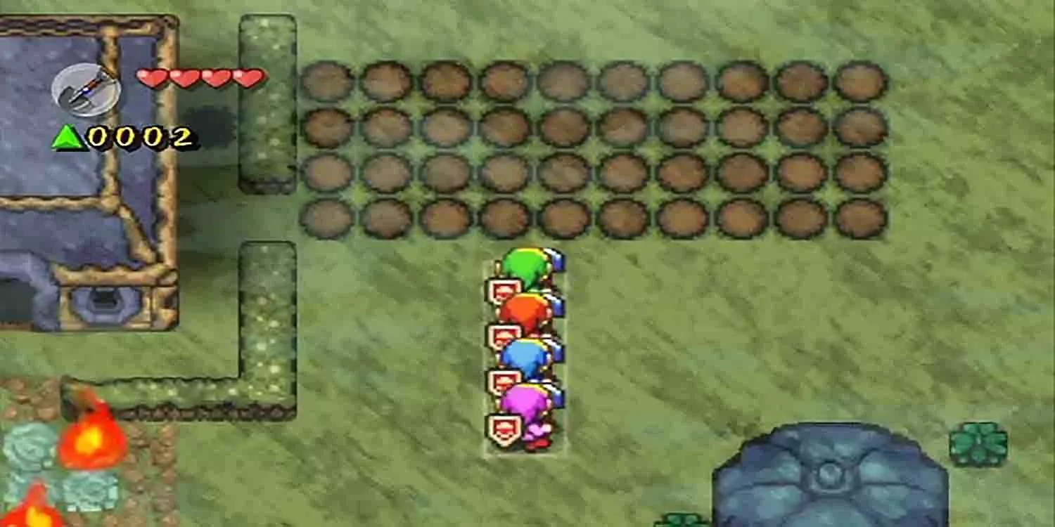 Four Links explore the Lost Woods in The Legend of Zelda: Four Swords Adventures.