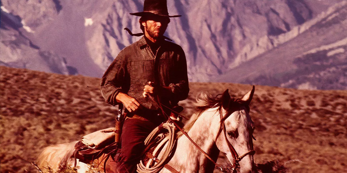 Clint Eastwood as The Stranger riding his horse toward trouble in the distance in High Plains Drifter.