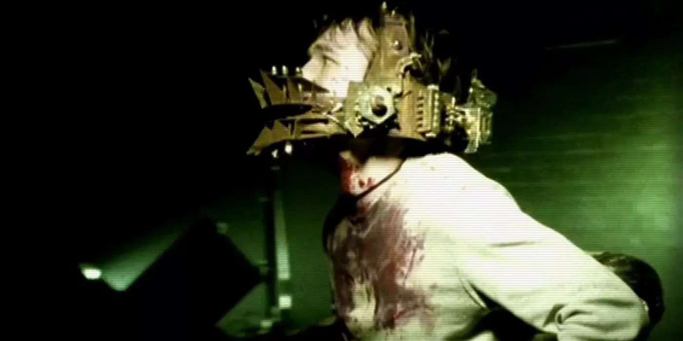 David captured by Jigsaw in Saw 0.5