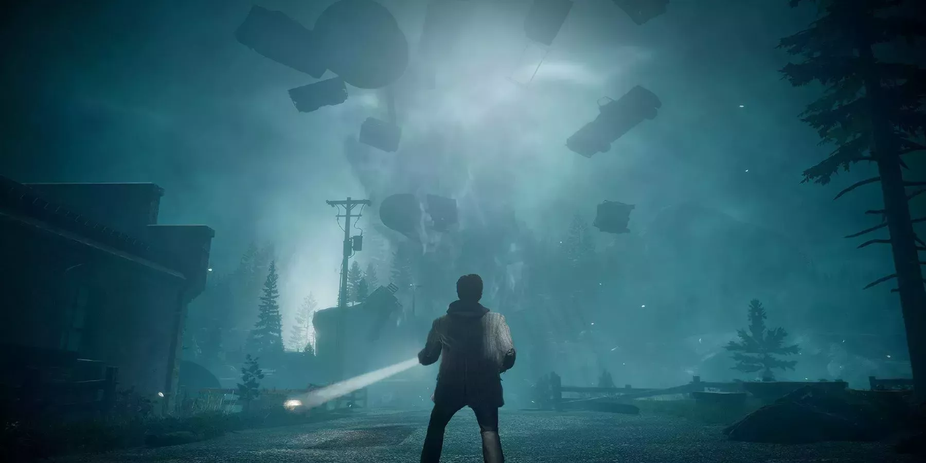 Alan Wake surveys an abandoned city at night on the cover for Alan Wake Remastered