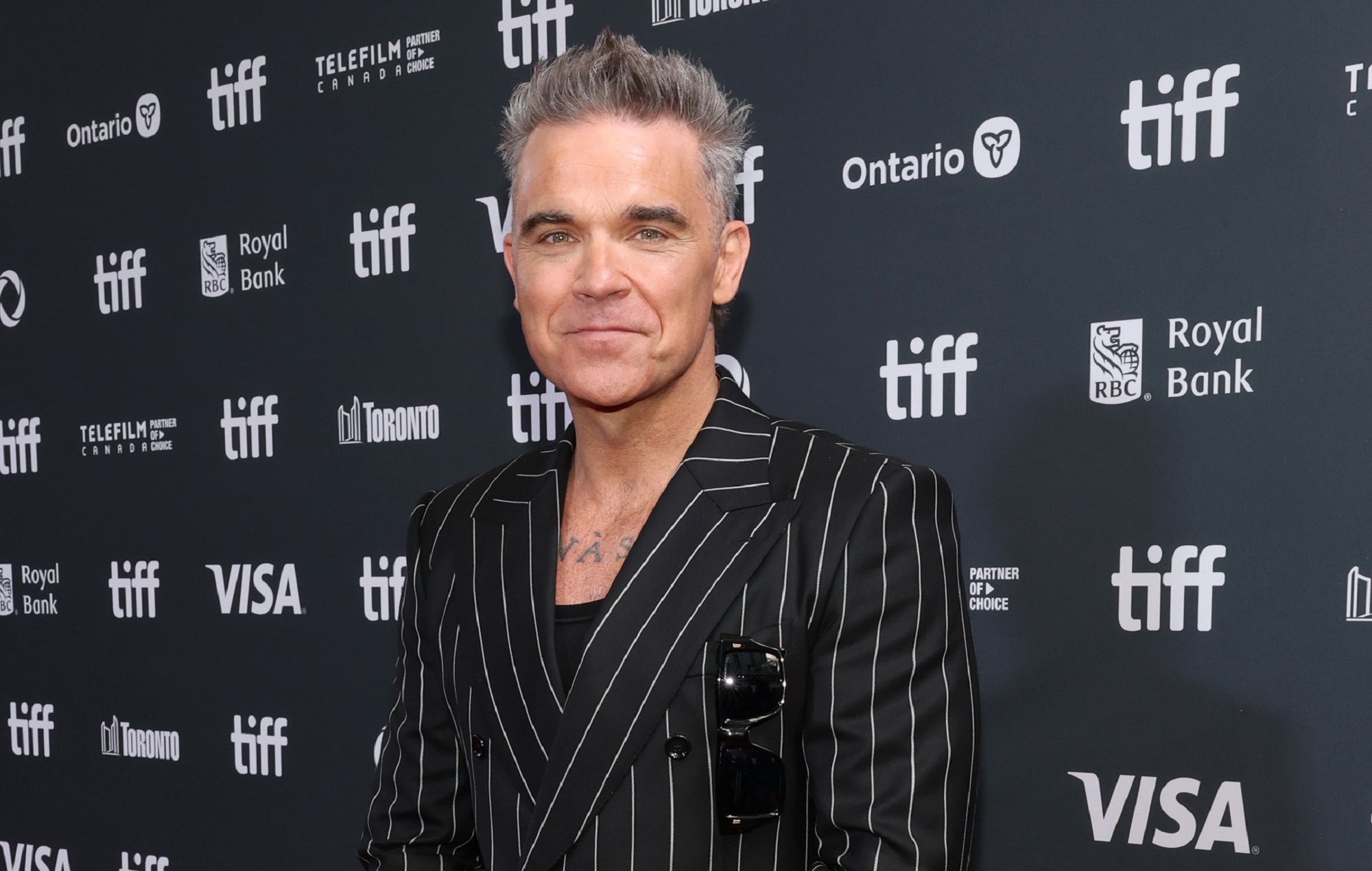 "Tiene una pinta increíble y es una locura": Los fans reaccionan ante el tráiler de la película biográfica de Robbie Williams "Better Man
