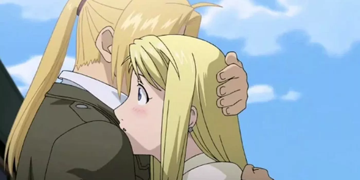 Winry y Edward abrazándose en Fullmetal Alchemist: Brotherhood