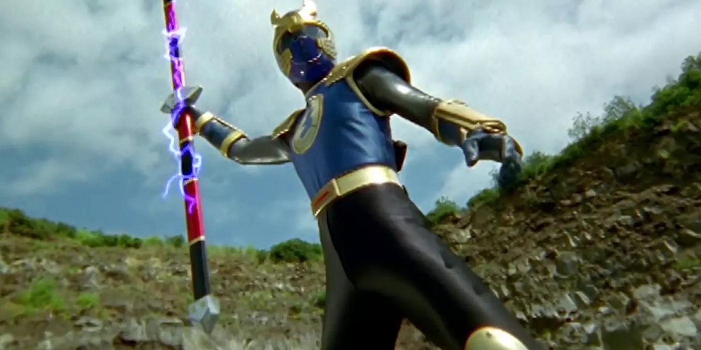 Navy Thunder Ranger Blake Bradley charges up his Thunder Staff- Power Rangers Ninja Storm