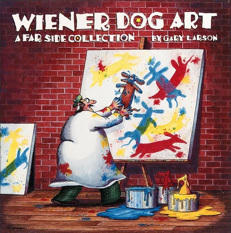 A man uses a dachshund dog to paint a painting of dachshund dogs.