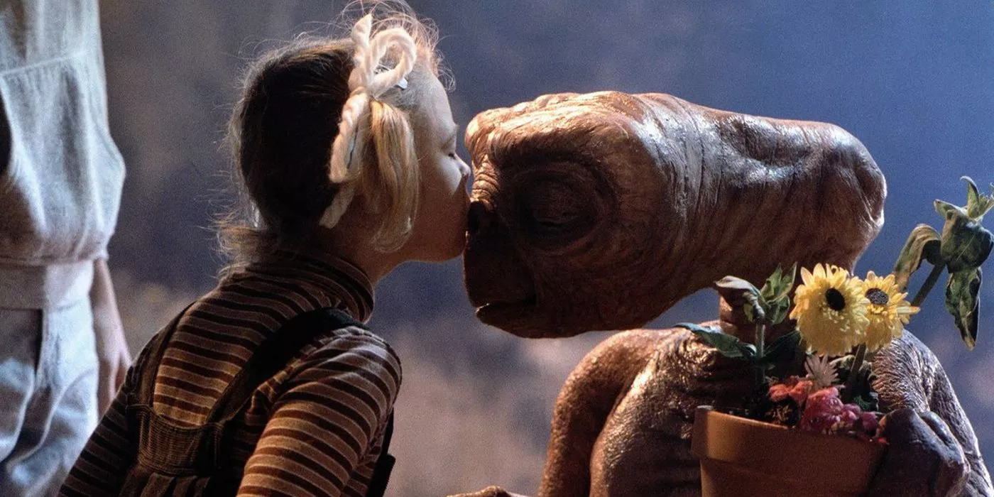 Gertie kisses E.T. in E.T. The Extraterrestrial.