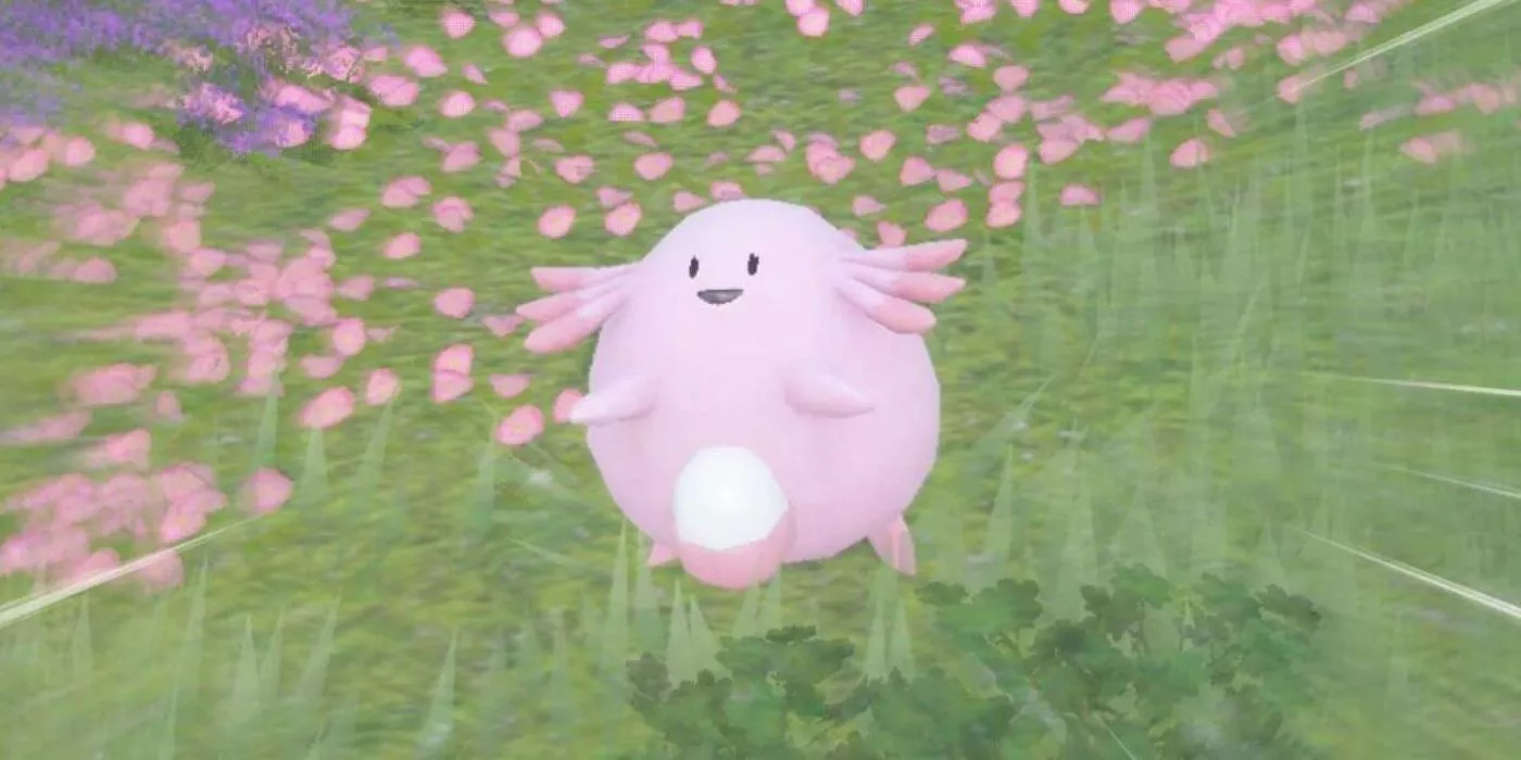 Chansey frolics in the flowers in Pokémon Scarlet & Violet.