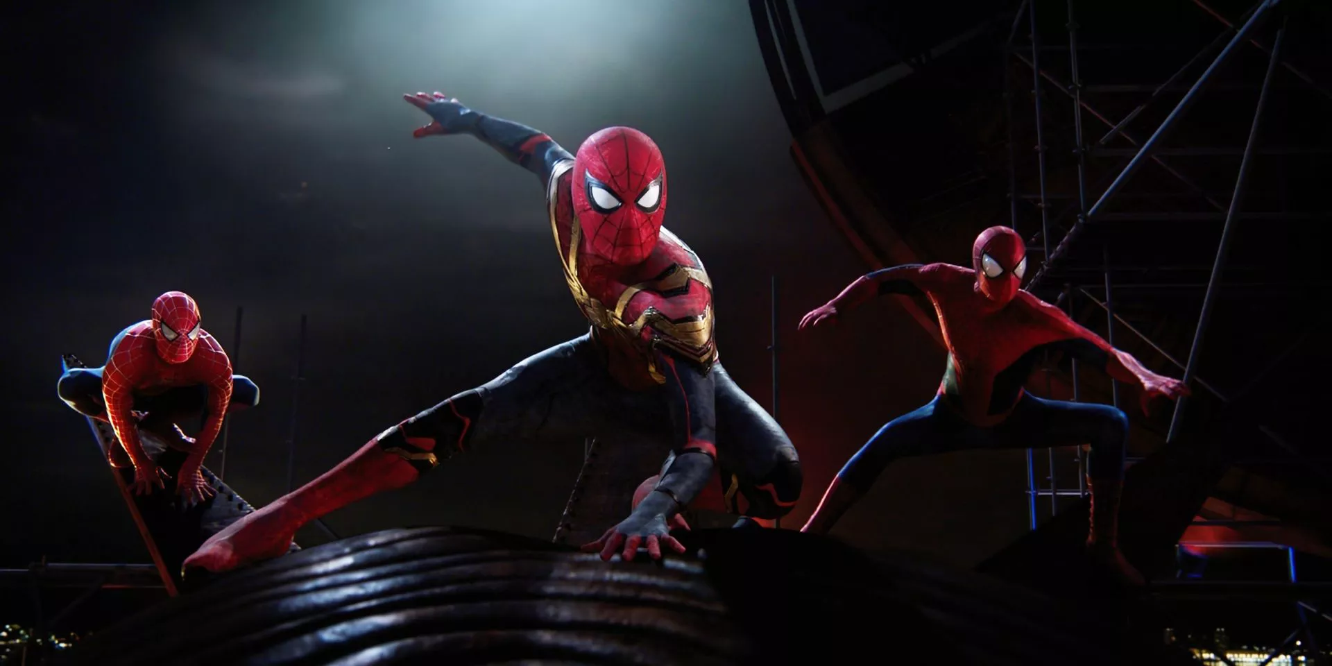 All three Spider-Men (Tobey Maguire, Andrew Garfield, and Tom Holland) land ready for battle in Spider-Man: No Way Home.
