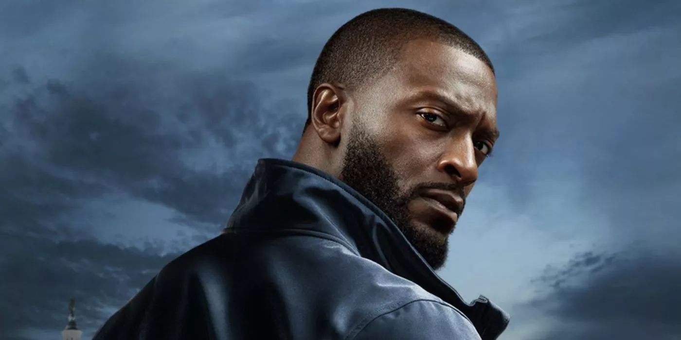 Aldis Hodge as Alex Cross looks over his shoulder in Cross