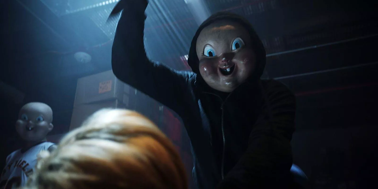 El Babyface Killer sosteniendo un cuchillo en Happy Death Day