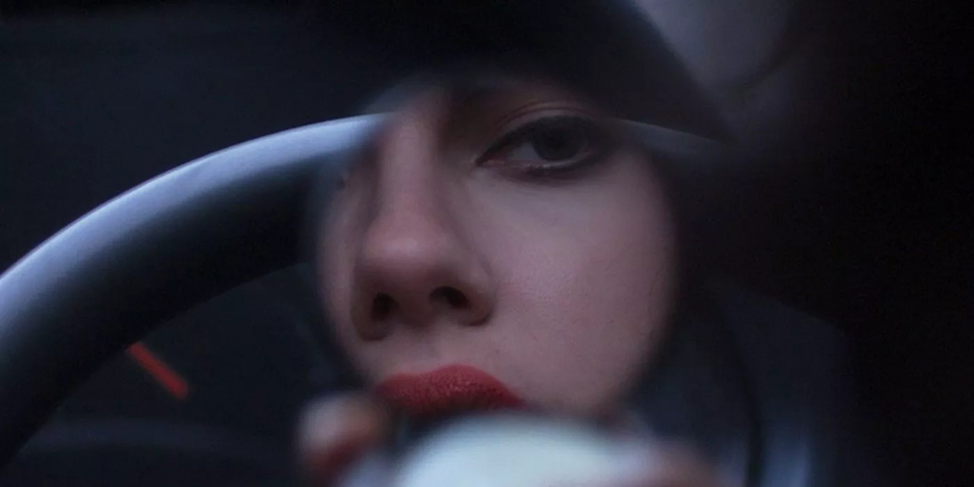 Scarlett Johansson's unnamed character in a rearview mirror 