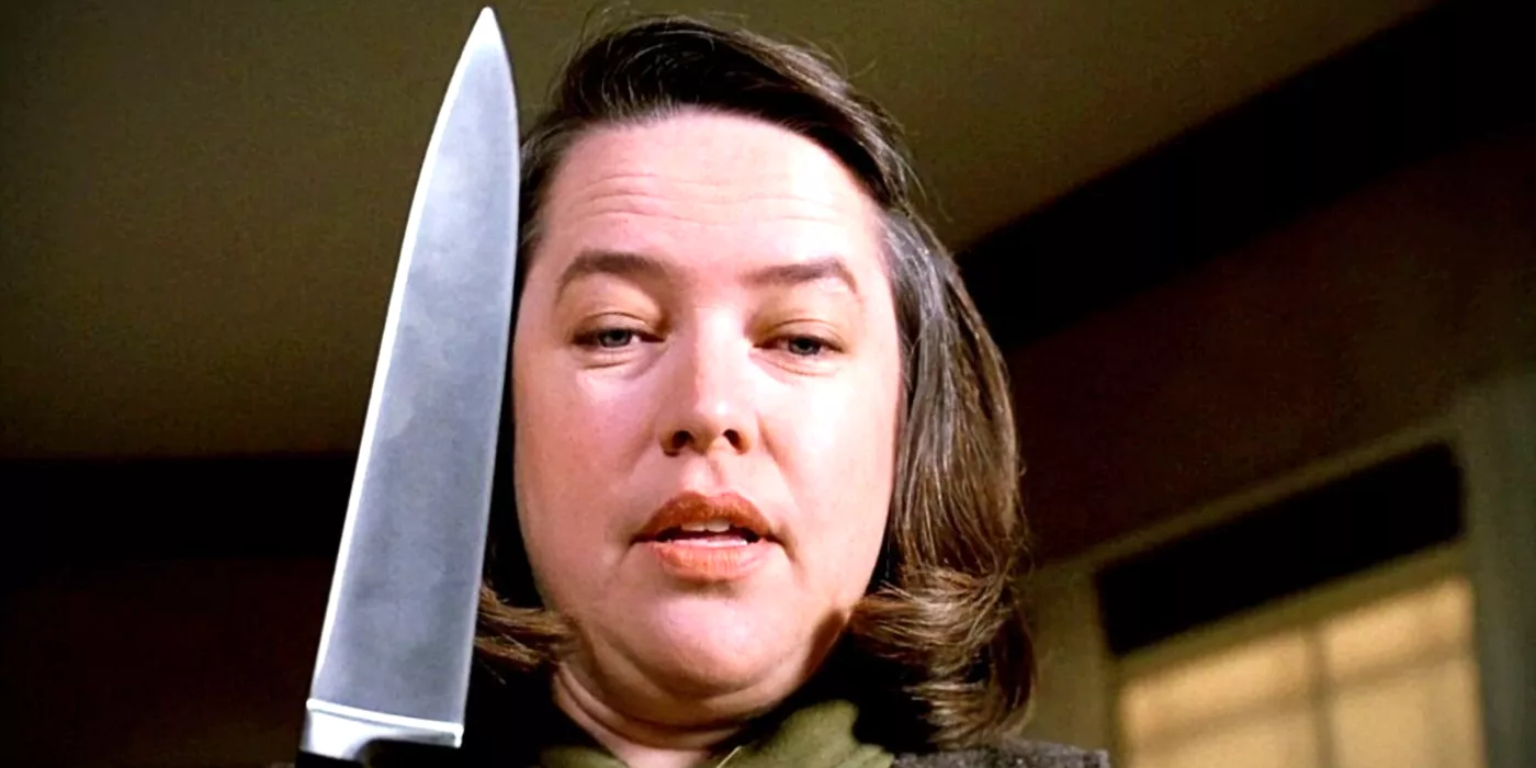 Annie Wilkes from Misery holding a knife.