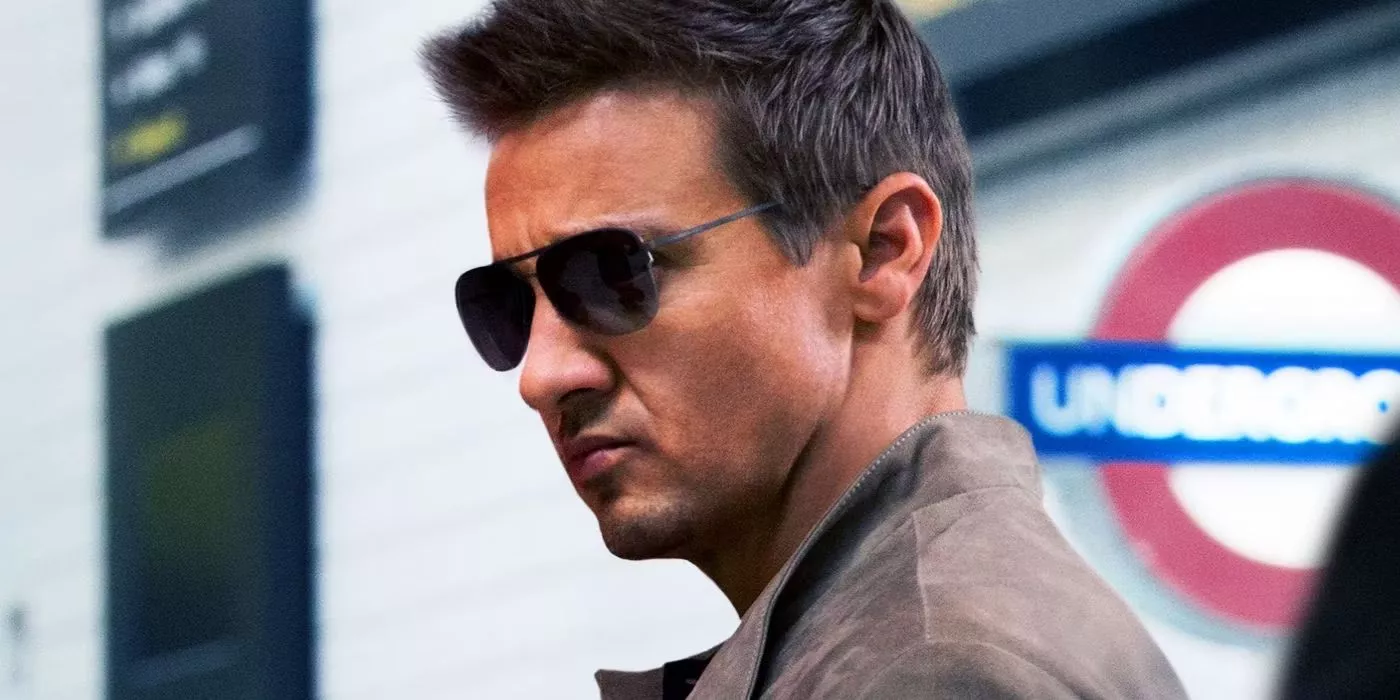 Jeremy Renner as William Brandt in Mission Impossible Rogue Nation wearing sunglasses.