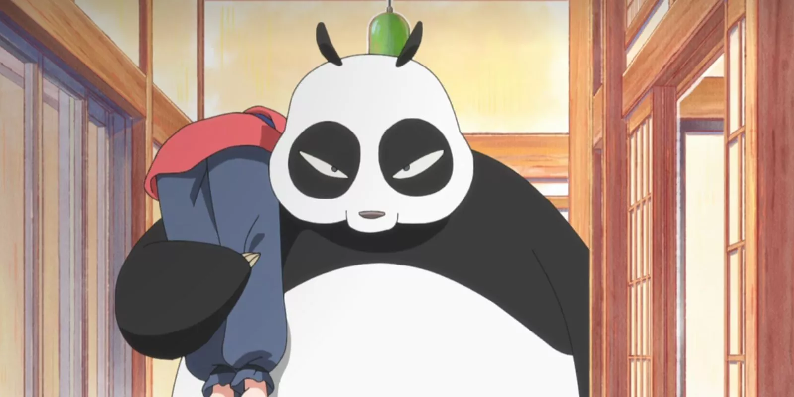 genma saotome carries his son while in panda form