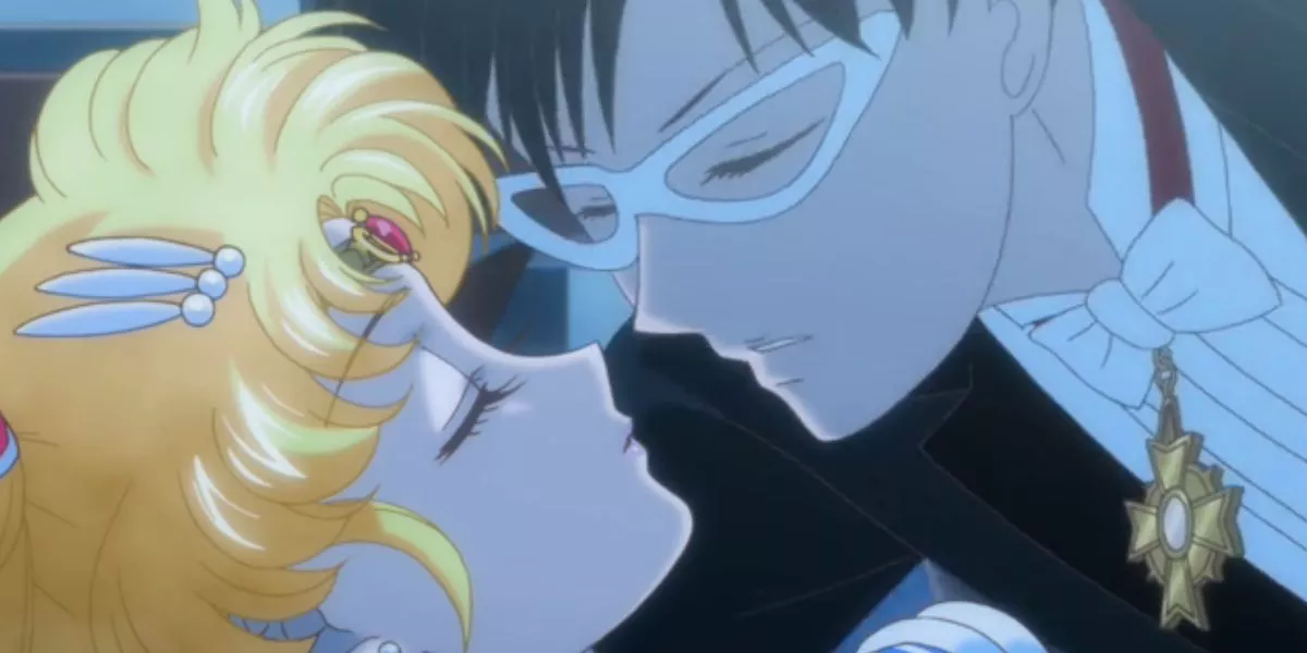 Tuxedo Mask besa a Sailor Moon en el baile de la Princesa D.'s en Sailor Moon Crystal.