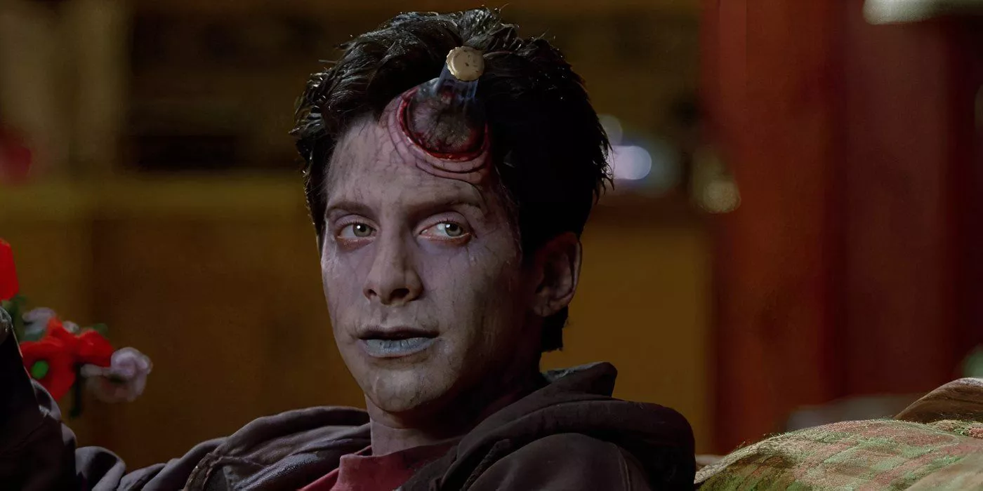 Mick is a zombie with a bottle stuck in his head in Idle Hands