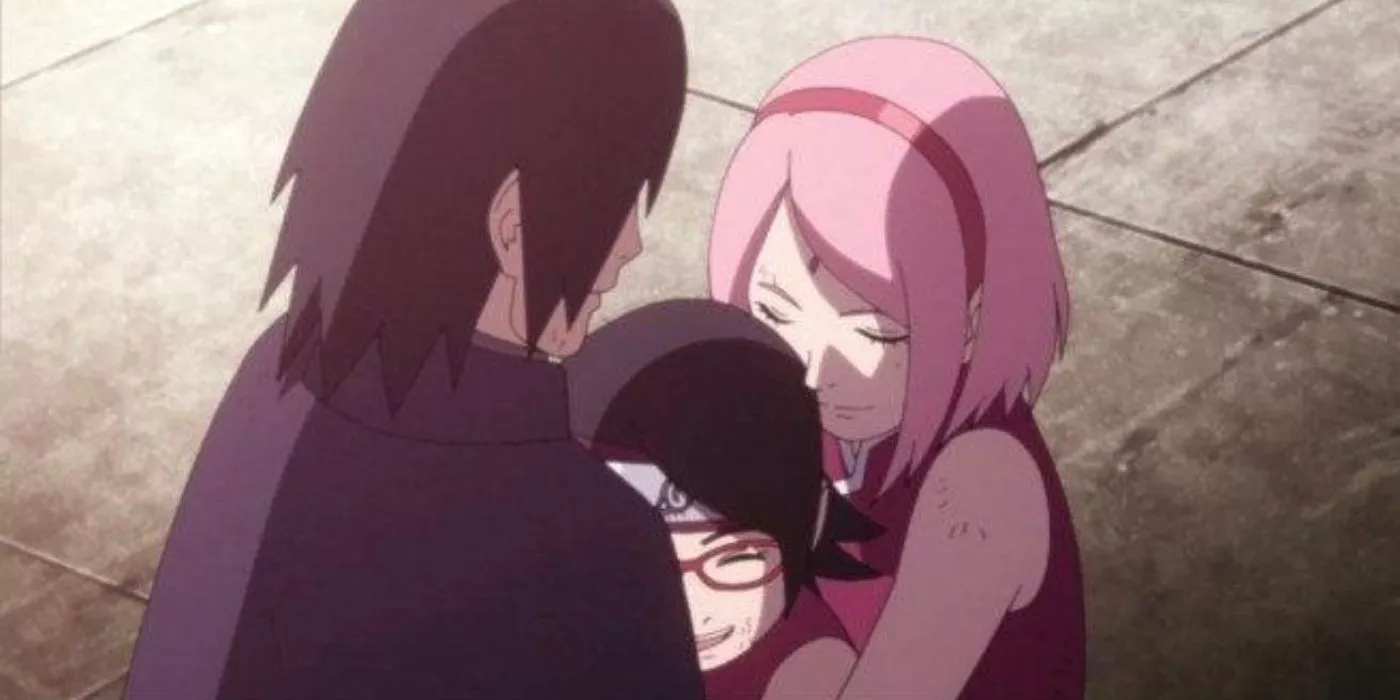 Sasuke, Sakura, and Sarada hug in Boruto.
