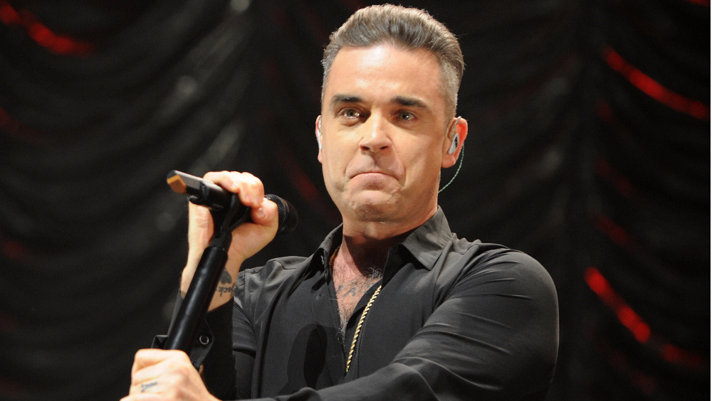 Robbie Williams sobre los rumores de sexualidad: 'Nunca has conocido a alguien que quiera ser gay tanto como yo'