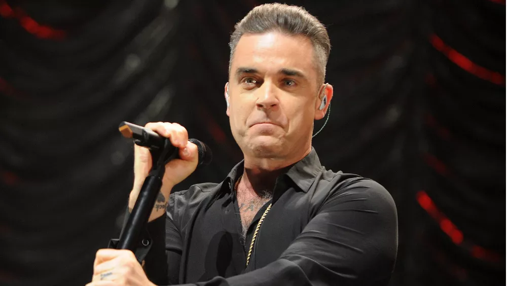 Robbie Williams sobre los rumores de sexualidad: 'Nunca has conocido a alguien que quiera ser gay tanto como yo'