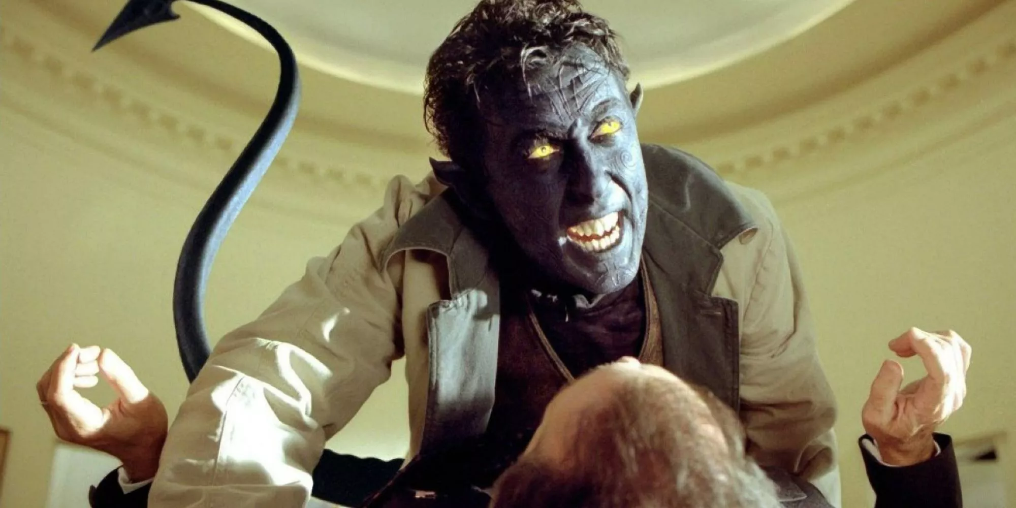 Alan Cumming as Nightcrawler attacks a man in X2: X-Men United.