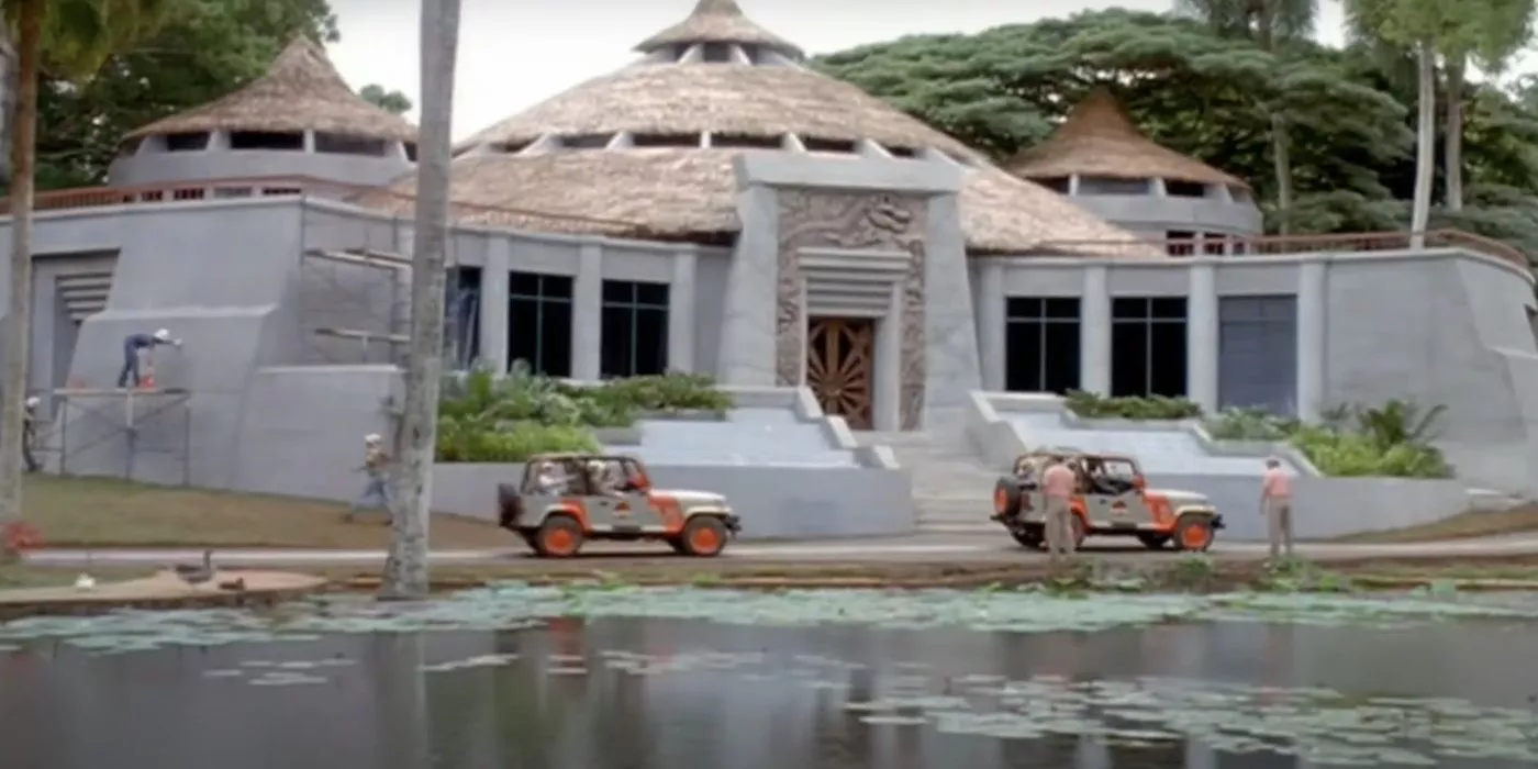 Cars driving up to visitor's center in Jurassic Park